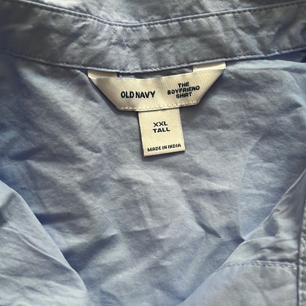 Blue chambray boyfriend style button up. Never worn,new with tags. Size xxl tall